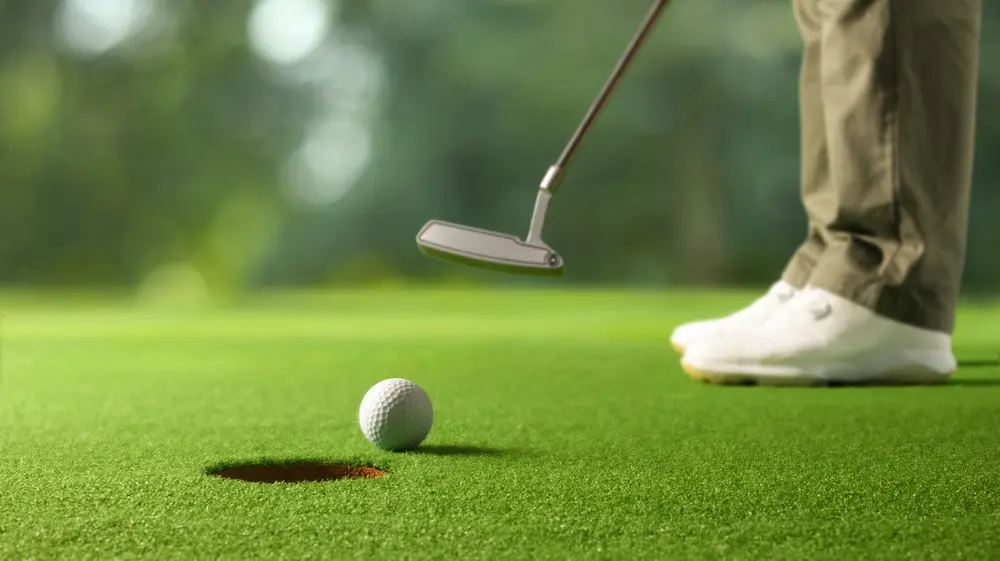 A man playing golf in Marietta